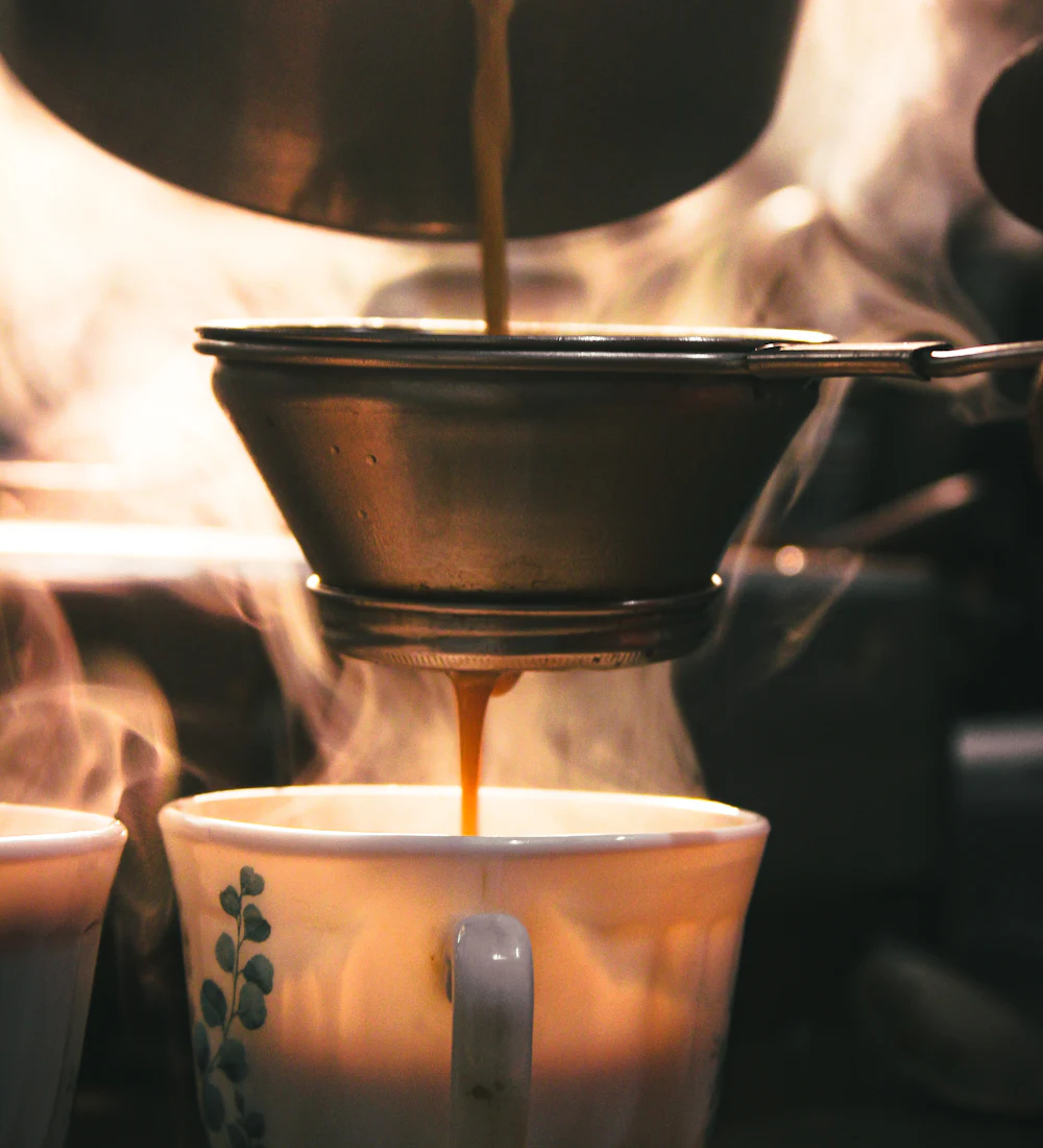 Fresh chai being strained
